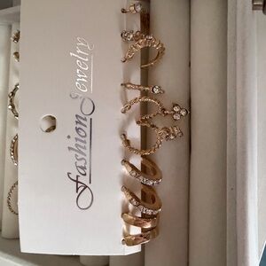 Elegant Gold Spiral Earrings with Crystals